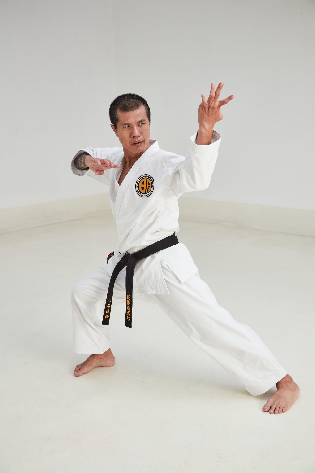 Kay in a grounded martial arts stance