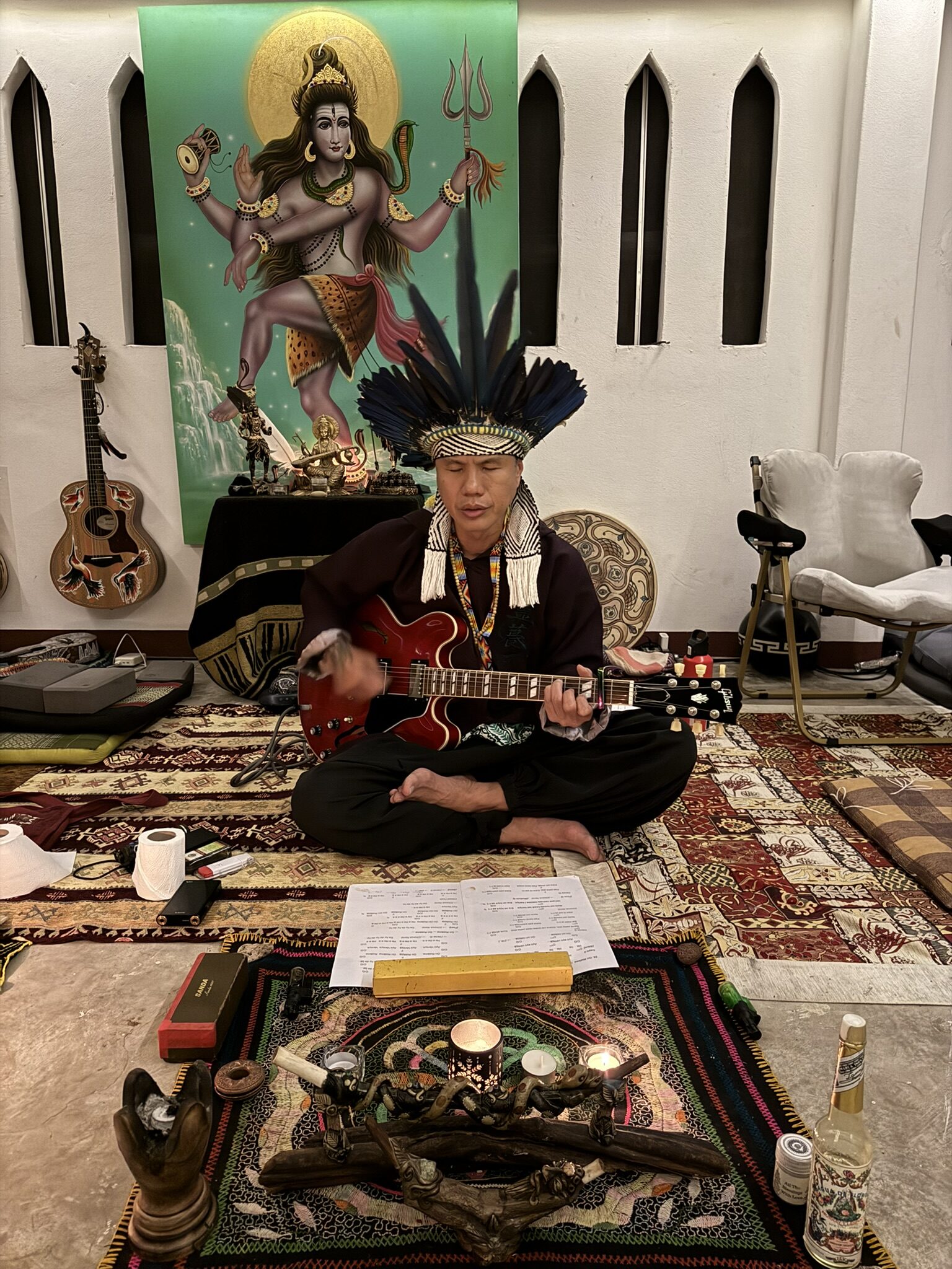 Ceremonial music with headdress and altar