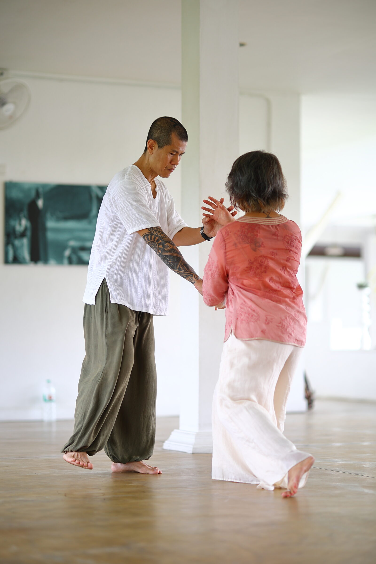 Push-hands practice with a student